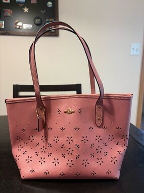 Coach Pink Perforated Floral bag with Gold Hardware